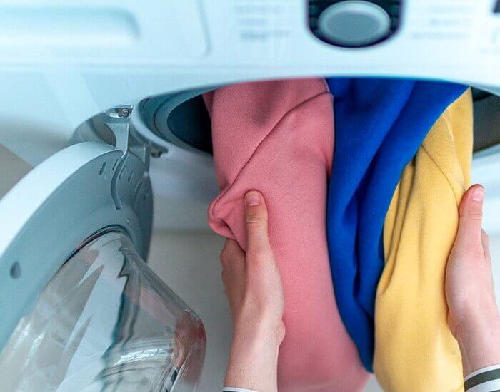شستن لباس در ماشین لباسشویی نف